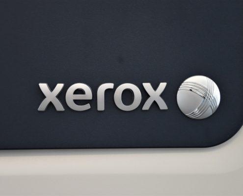 X-NRW Schauraum IT-Services Systeme auf Maximum Xerox-Logo